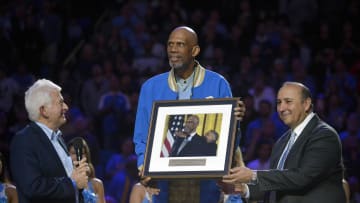 UCLA Bruins former player Kareem Abdul-Jabbar presented a photograph of him receiving the Presidential Medal of Freedom . Mandatory Credit: Gary A. Vasquez-USA TODAY Sports