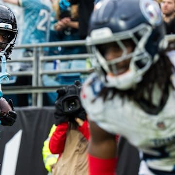 Dec 29, 2024; Jacksonville, Florida, USA; Jacksonville Jaguars wide receiver Brian Thomas Jr (7) celebrates a touchdown against the Tennessee Titans in the fourth quarter at EverBank Stadium. Mandatory Credit: Jeremy Reper-Imagn Images