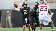 Oct 5, 2024; Nashville, Tennessee, USA;  Vanderbilt Commodores quarterback Diego Pavia (2) scrambles against the Alabama Crimson Tide during the second half at FirstBank Stadium. Mandatory Credit: Steve Roberts-Imagn Images