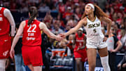 May 17, 2025; Indianapolis, Indiana, USA; Indiana Fever guard Caitlin Clark (22) and Chicago Sky forward Angel Reese (5) shake hands before the game at Gainbridge Fieldhouse. Mandatory Credit: Trevor Ruszkowski-Imagn Images