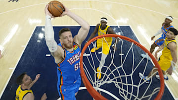Jun 11, 2025; Indianapolis, Indiana, USA; Oklahoma City Thunder center Isaiah Hartenstein (55) dunks against the Indiana Pacers during the first half during game three of the 2025 NBA Finals at Gainbridge Fieldhouse. Mandatory Credit: Abbie Parr-Pool Photo via Imagn Images