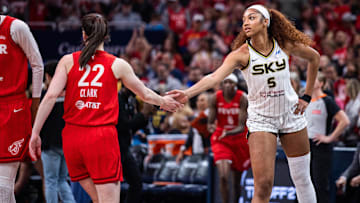 Indiana Fever guard Caitlin Clark and Chicago Sky forward Angel Reese shake hands before the game at Gainbridge Fieldhouse. 