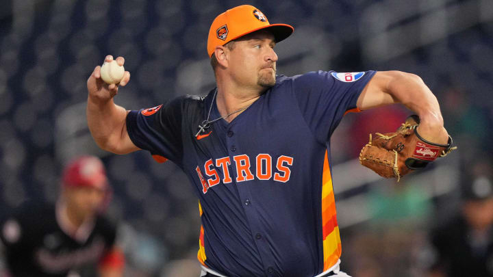 Mar 14, 2024; West Palm Beach, Florida, USA; Houston Astros pitcher Joel Kuhnel (92) pitches in the sixth inning against the Washington Nationals at CACTI Park of the Palm Beaches.