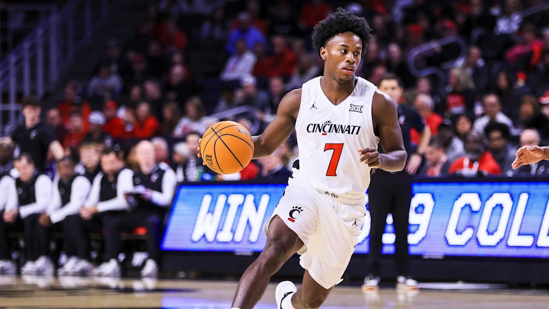 Nov 24, 2025; Cincinnati, Ohio, USA; Cincinnati Bearcats guard Keyshuan Tillery (7) dribbles against the NJIT Highlanders in the first half at Fifth Third Arena. Mandatory Credit: Katie Stratman-Imagn Images