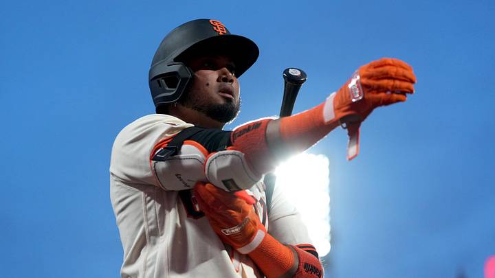 San Francisco, California, USA; San Francisco Giants second baseman Luis Arraez (1) walks towards the on deck circle against the New York Yankees in the eighth inning at Oracle Park. Mandatory Credit: Cary Edmondson-Imagn Images