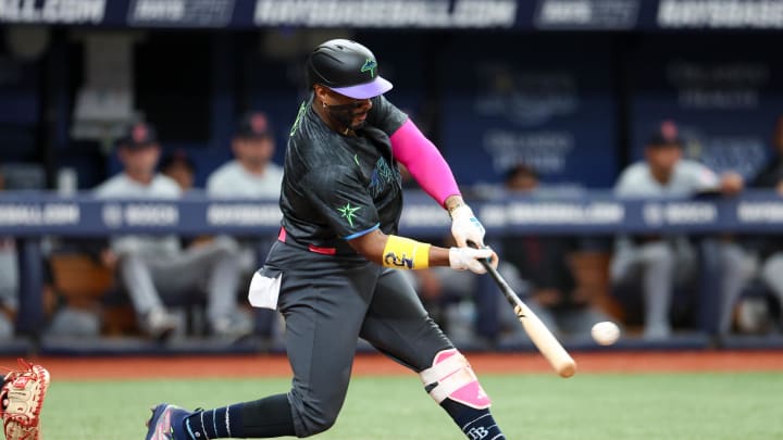 Tampa Bay Rays first baseman Yandy Diaz (2) hits an rbi double against the Cleveland Guardians in the third inning at Tropicana Field in 2024.