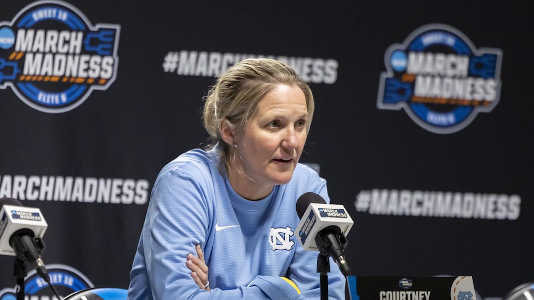 Mar 27, 2025; Birmingham, AL, USA; UNC Tar Heels head coach Courtney Banghart talks with the media before her team works out during practice day at Legacy Arena. Mandatory Credit: Vasha Hunt-Imagn Images