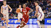 Mar 15, 2025; Nashville, TN, USA;  Alabama Crimson Tide guard Labaron Philon (0) drives to the basket against the Florida Gators during the second half at Bridgestone Arena. Mandatory Credit: Steve Roberts-Imagn Images