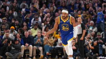 Apr 2, 2024; San Francisco, California, USA; Golden State Warriors guard Moses Moody (4) reacts after making a three point basket against the Dallas Mavericks in the second quarter at the Chase Center. Mandatory Credit: Cary Edmondson-USA TODAY Sports