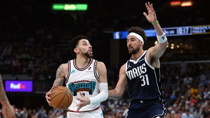 Apr 18, 2025; Memphis, TN; Klay Thompson defends a drive from Scotty Pippen, Jr. during the third quarter at FedExForum