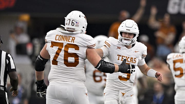 Dec 2, 2023; Arlington, TX, USA;  Texas Longhorns offensive lineman Hayden Conner (76) and quarterback Quinn Ewers (3) celebrate during the second half of the game against the Oklahoma State Cowboys at AT&T Stadium. Mandatory Credit: Jerome Miron-Imagn Images