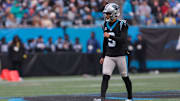 Nov 30, 2025; Charlotte, North Carolina, USA; Carolina Panthers quarterback Bryce Young (9) looks on during the second quarter against the Los Angeles Rams at Bank of America Stadium. Mandatory Credit: Scott Kinser-Imagn Images