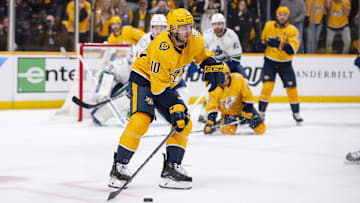 Apr 26, 2024; Nashville, Tennessee, USA; Nashville Predators center Colton Sissons (10) skates against the Vancouver Canucks during the third period in game three of the first round of the 2024 Stanley Cup Playoffs at Bridgestone Arena. Mandatory Credit: Steve Roberts-Imagn Images