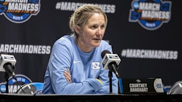 Mar 27, 2025; Birmingham, AL, USA; UNC Tar Heels head coach Courtney Banghart talks with the media before her team works out during practice day at Legacy Arena. Mandatory Credit: Vasha Hunt-Imagn Images
