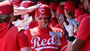 Sep 17, 2025; St. Louis, Missouri, USA; Cincinnati Reds teammates shower Cincinnati Reds first baseman Spencer Steer (7) with money in the dugout after he hit a three-run home run against the St. Louis Cardinals at Busch Stadium. Mandatory Credit: Tim Vizer-Imagn Images