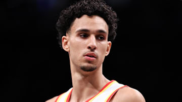 Zaccharie Risacher #10 of the Atlanta Hawks looks on against the Brooklyn Nets.
