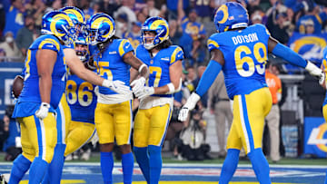 Jan 13, 2025; Glendale, AZ, USA; Los Angeles Rams tight end Davis Allen (87) reacts after making a catch for a touchdown against the Minnesota Vikings during the first half in an NFC wild card game at State Farm Stadium. Mandatory Credit: Joe Camporeale-Imagn Images