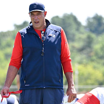 Jul 23, 2025; Foxborough, MA, USA; New England Patriots head coach Mike Vrabel watches over players during training camp at Gillette Stadium. Mandatory Credit: Eric Canha-Imagn Images