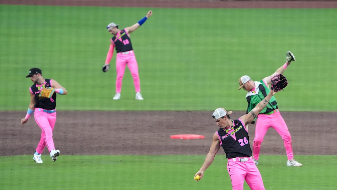 The Party Animals’ Nate Teller leads the group in the delivery of a pitch against The Visitors as the Savannah Bananas came back to Louisville Slugger Park this Thursday.
June 26, 2025
