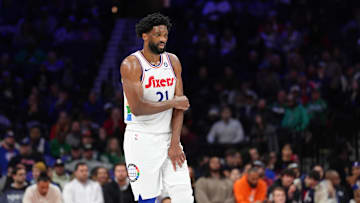 Feb 11, 2025; Philadelphia, Pennsylvania, USA; Philadelphia 76ers center Joel Embiid (21) holds his arm after falling against the Toronto Raptors in the second quarter at Wells Fargo Center. Mandatory Credit: Kyle Ross-Imagn Images