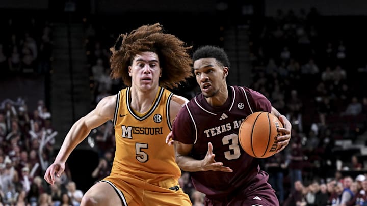 Feb 11, 2026; College Station, Texas, USA; Texas A&M Aggies guard Rylan Griffen (3) drives against Missouri Tigers guard T.O. Barrett (5) during the second half at Reed Arena. Mandatory Credit: Maria Lysaker-Imagn Images 