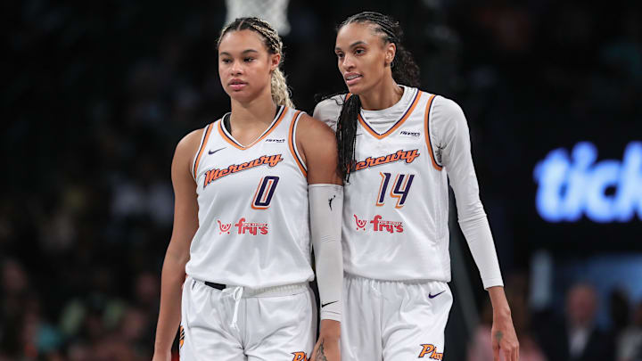 Sep 17, 2025; Brooklyn, New York, USA; Phoenix Mercury forward DeWanna Bonner (14) talks with forward Satou Sabally (0) during game two of round one for the 2025 WNBA Playoffs against the New York Liberty at Barclays Center. Mandatory Credit: Wendell Cruz-Imagn Images Sep 17, 2025; Brooklyn, New York, USA; Phoenix Mercury forward DeWanna Bonner (14) talks with forward Satou Sabally (0) during game two of round one for the 2025 WNBA Playoffs against the New York Liberty at Barclays Center. Mandatory Credit: Wendell Cruz-Imagn Images