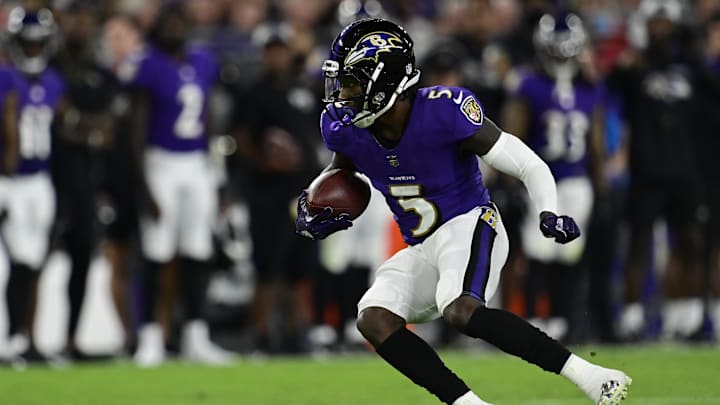 Sep 19, 2021; Baltimore, Maryland, USA; Baltimore Ravens wide receiver Marquise Brown (5) runs with the ball during the first half against the Kansas City Chiefs  at M&T Bank Stadium. Mandatory Credit: Tommy Gilligan-Imagn Images