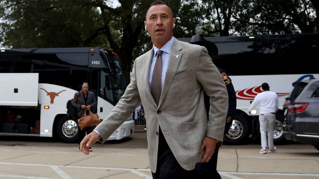 Oct 25, 2025; Starkville, Mississippi, USA; Texas Longhorns head coach Steve Sarkisian walk from the bus into Davis Wade Stadium at Scott Field prior to the game against the Mississippi State Bulldogs. Mandatory Credit: Petre Thomas-Imagn Images