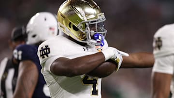 Notre Dame Fighting Irish running back Jeremiyah Love celebrates a first down against the Penn State Nittany Lions in the Orange Bowl 