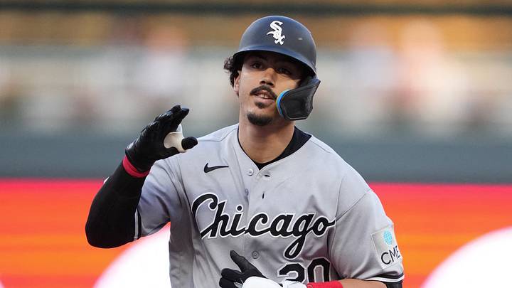 Chicago White Sox third baseman Miguel Vargas (20) reacts