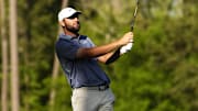 Apr 12, 2024; Augusta, Georgia, USA; Scottie Scheffler tees off on No. 12 during the second round of