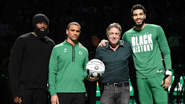 Feb 15, 2023; Boston, Massachusetts, USA;  Boston Celtics guard Jaylen Brown (7) head coach Joe Mazzulla Governor Wyc Grousbeck and forward Jayson Tatum (0) are honored for their all star selection prior to a game against the Detroit Pistons at TD Garden. Mandatory Credit: Bob DeChiara-Imagn Images