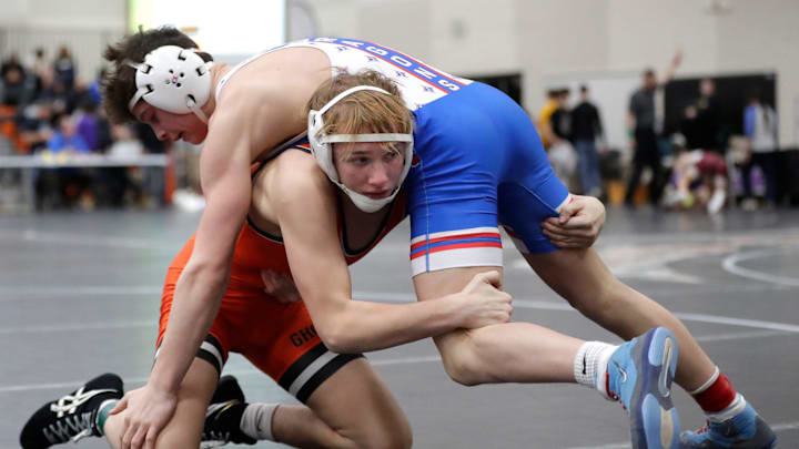 Kaukauna High School’s Andy Dipiazza (pictured in orange) wrestles during the Cheesehead Invitational on Friday, January 3, 2025. Kaukauna High School’s Andy Dipiazza (pictured in orange) wrestles during the Cheesehead Invitational on Friday, January 3, 2025.