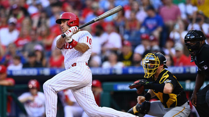 Aug 27, 2022; Philadelphia, Pennsylvania, USA; Philadelphia Phillies catcher JT Realmuto (10) hits an RBI double against the Pittsburgh Pirates in the first inning at Citizens Bank Park. Kyle Ross-USA TODAY Sports