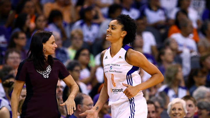 Sep 7, 2014; Phoenix, AZ, USA; Phoenix Mercury forward Candice Dupree (4) with head coach Sandy Brondello against the Chicago Sky during game one of the WNBA Finals at US Airways Center. The Mercury defeated the Sky 83-62. Mandatory Credit: Mark J. Rebilas-Imagn Images
Sep 7, 2014; Phoenix, AZ, USA; Phoenix Mercury forward Candice Dupree (4) with head coach Sandy Brondello against the Chicago Sky during game one of the WNBA Finals at US Airways Center. The Mercury defeated the Sky 83-62. Mandatory Credit: Mark J. Rebilas-Imagn Images