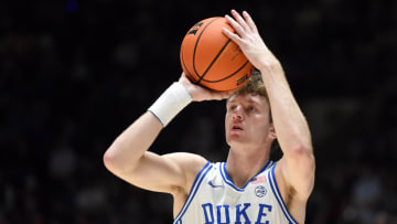 Nov 17, 2023; Durham, North Carolina, USA; Duke Blue Devils forward TJ Power (12) shoots a three pointer during the second half against the Bucknell Bison at Cameron Indoor Stadium. Mandatory Credit: Rob Kinnan-USA TODAY Sports