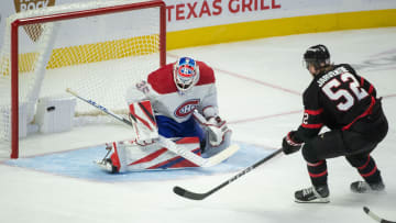 Oct 3, 2023; Ottawa, Ontario, CAN; Ottawa Senators right wing Roby Jarventie (52) scores against Montreal Canadiens goalie Sam Montembeault (35) in the third period at the Canadian Tire Centre. Mandatory Credit: Marc DesRosiers-USA TODAY Sports