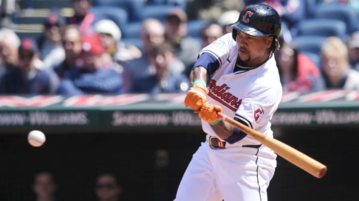 Apr 25, 2024; Cleveland, Ohio, USA; Cleveland Guardians designated hitter Jose Ramirez (11) hits a grand slam during the second inning against the Boston Red Sox at Progressive Field. Mandatory Credit: Ken Blaze-USA TODAY Sports