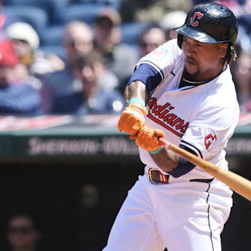 Apr 25, 2024; Cleveland, Ohio, USA; Cleveland Guardians designated hitter Jose Ramirez (11) hits a grand slam during the second inning against the Boston Red Sox at Progressive Field. Mandatory Credit: Ken Blaze-USA TODAY Sports