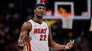 Feb 29, 2024; Denver, Colorado, USA; Miami Heat forward Jimmy Butler (22) reacts after a play in the second quarter against the Denver Nuggets at Ball Arena. Mandatory Credit: Isaiah J. Downing-Imagn Images