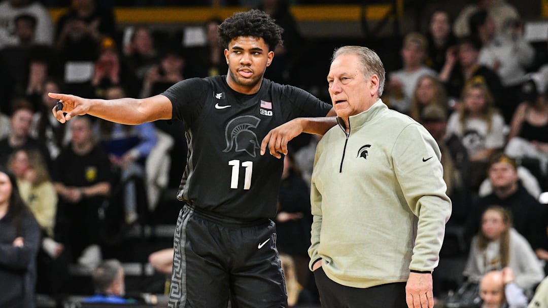 Mar 6, 2025; Iowa City, Iowa, USA; Michigan State Spartans head coach Tom Izzo talks with guard Jase Richardson (11) during the first half against the Iowa Hawkeyes at Carver-Hawkeye Arena. Mandatory Credit: Jeffrey Becker-Imagn Images