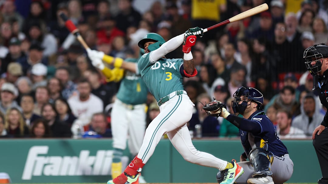 May 8, 2026; Boston, Massachusetts, USA; Boston Red Sox center fielder Ceddanne Rafaela (3) hits a solo home run during the fourth inning against the Tampa Bay Rays at Fenway Park. Mandatory Credit: Paul Rutherford-Imagn Images