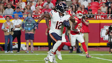Aug 22, 2024; Kansas City, Missouri, USA; Chicago Bears wide receiver Velus Jones Jr. (12) runs the ball against the Kansas City Chiefs during the game at GEHA Field at Arrowhead Stadium. Mandatory Credit: Denny Medley-Imagn Images