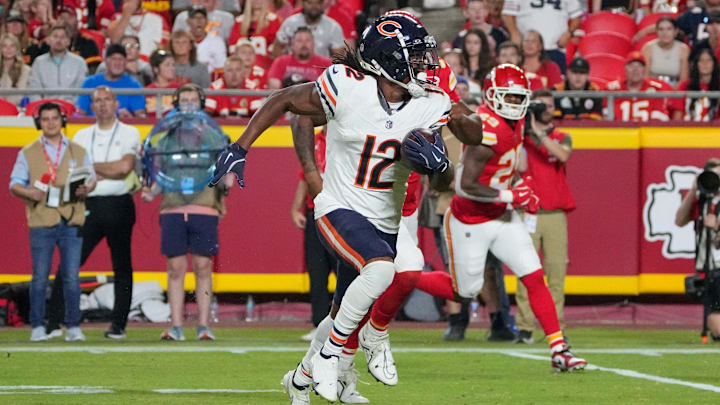 Aug 22, 2024; Kansas City, Missouri, USA; Chicago Bears wide receiver Velus Jones Jr. (12) runs the ball against the Kansas City Chiefs during the game at GEHA Field at Arrowhead Stadium. Mandatory Credit: Denny Medley-Imagn Images