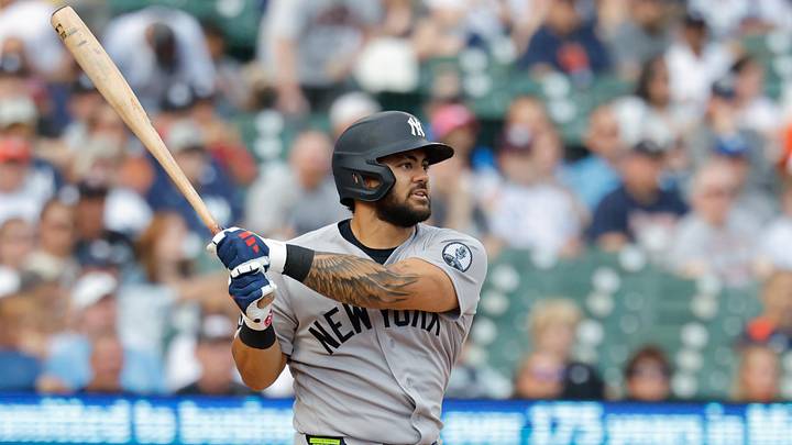 Jun 23, 2026; Detroit, Michigan, USA;  New York Yankees designated hitter Jasson Dominguez (24) hits a double in the first inning against the Detroit Tigers at Comerica Park. Mandatory Credit: Rick Osentoski-Imagn Images
