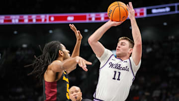Mar 11, 2025; Kansas City, MO, USA; Kansas State Wildcats guard Brendan Hausen (11) shoots the ball over Arizona State Sun Devils guard Amier Ali (5) during the first half at T-Mobile Center. Mandatory Credit: William Purnell-Imagn Images