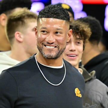 Feb 19, 2025; South Bend, Indiana, USA; Notre Dame head football coach Marcus Freeman and team are honored in the first half of the game between the Notre Dame Fighting Irish and the SMU Mustangs at the Purcell Pavilion.