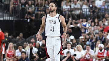 Jul 10, 2024; Las Vegas, Nevada, USA; USA guard Steph Curry (4) celebrates scoring on Canada during the first quarter of the USA Basketball Showcase at T-Mobile Arena. Mandatory Credit: Candice Ward-Imagn Images