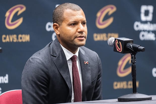 Koby Altman talks to the media