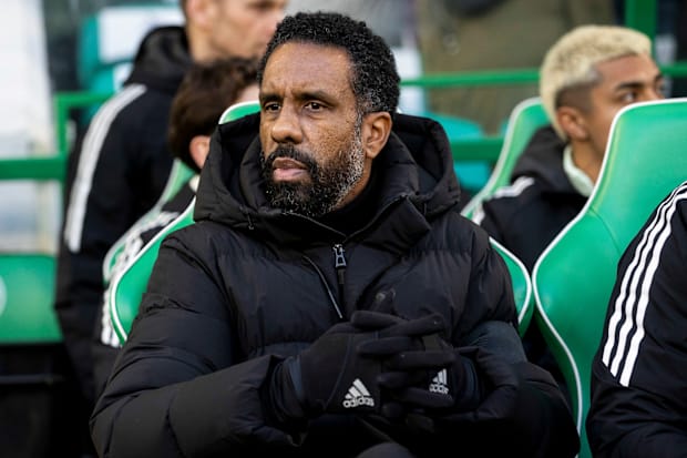 Wilfried Nancy seated on the Celtic sideline.